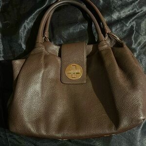 Kate spade leather dark brown shoulder bag purple lining.